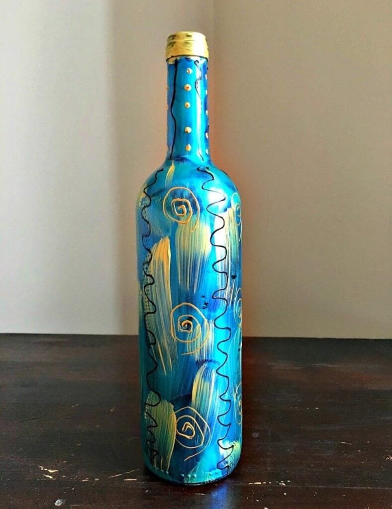 A water bottle decorated with glass paint